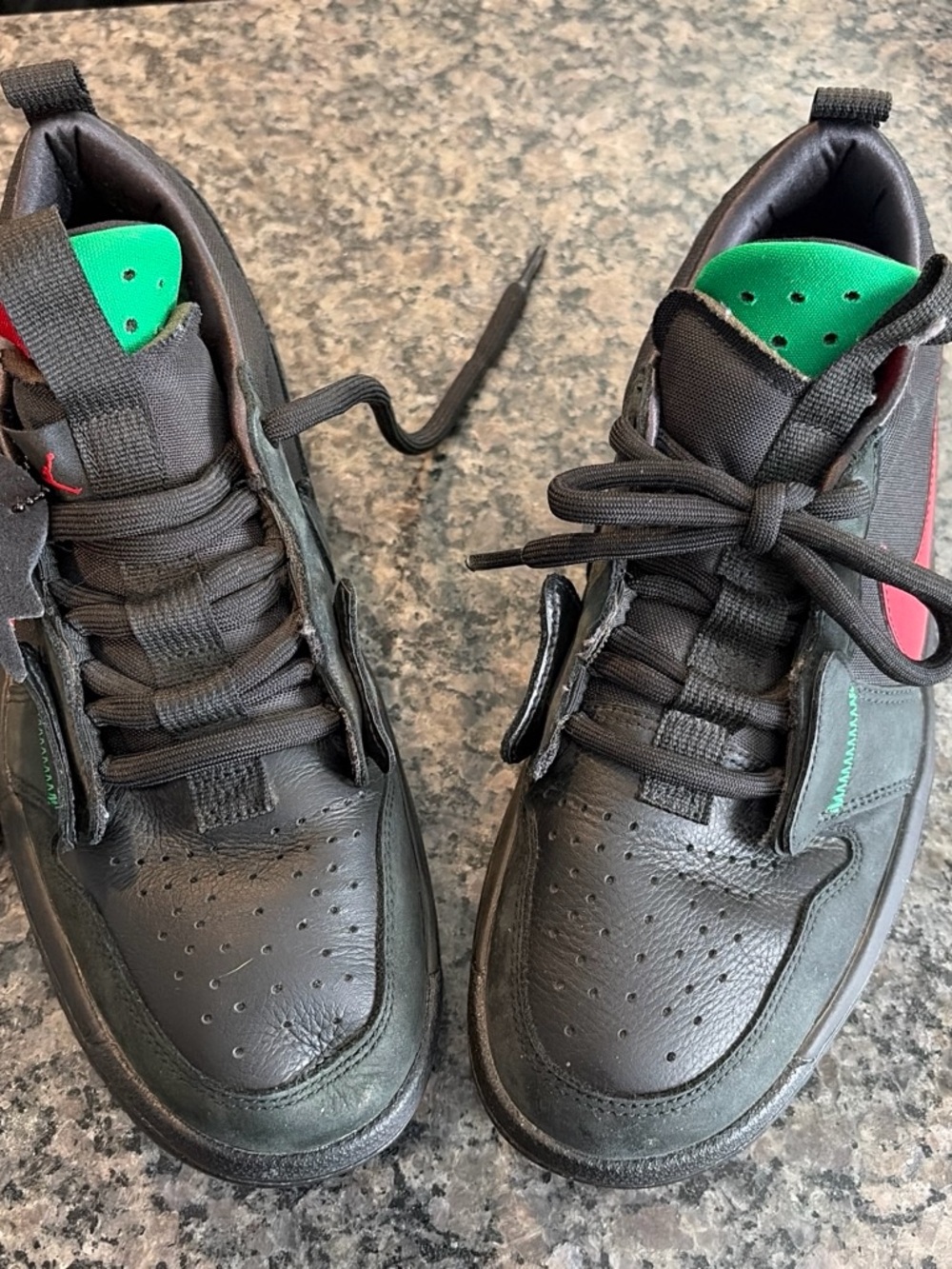 Jordan Men's Black Athletic Sneakers with Green Tongue and Red Swoosh